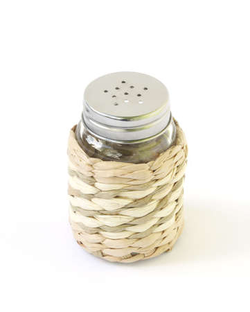 Salt shaker over whiteの写真素材