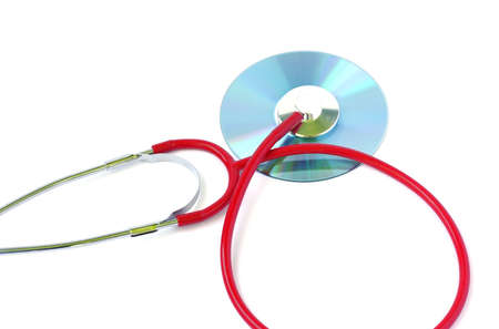 Data security concept with disk and stethoscopeの写真素材