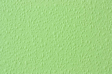 Green wavy surface backgroundの写真素材