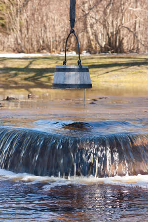 Spring flood, boiling well