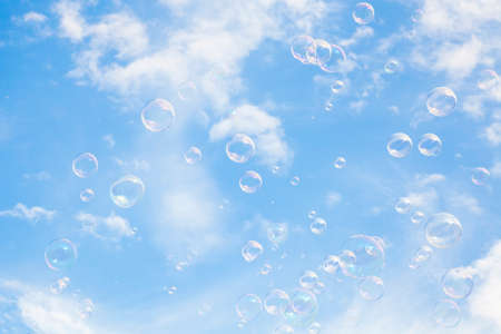 Blue sky and soap bubbles, abstract background