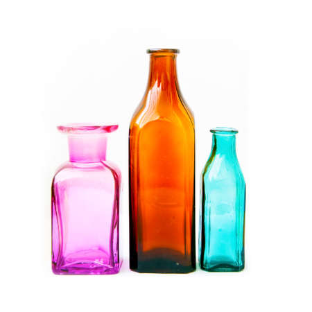 Old medical bottles on white background