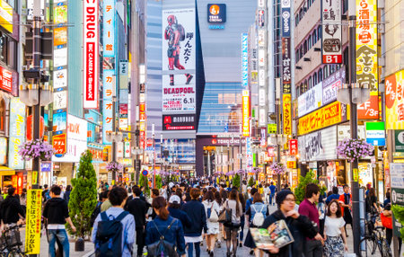TOKYO, JAPAN - April 29, 2018: Busy evening street in Shinjuku districtのeditorial素材