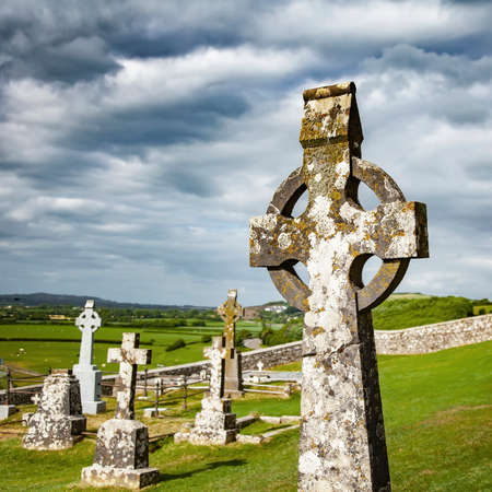 Celtic cross and old irish cemetery in Cashel, Irelandの写真素材