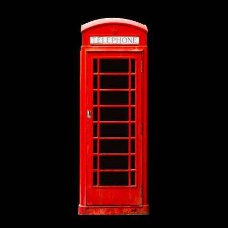 Red british phone booth isolated on blackの写真素材