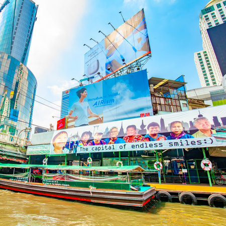BANGKOK, THAILAND - 20 April, 2019: Touristic advertising banner with slogan The capital of endless smilesのeditorial素材