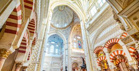 CORDOBA, SPAIN - February 15, 2020: Panorama of Mezquita interior, catholic dome and arabic arches insideのeditorial素材