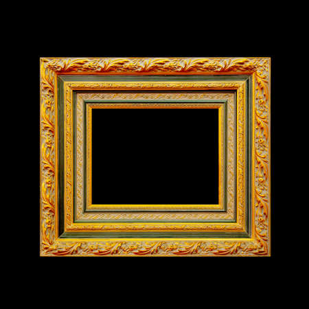 Empty picture wooden frame isolated on black backgroundの写真素材