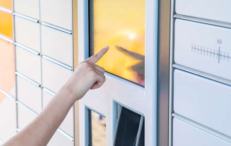 Self service post terminal machine and parcel sendingの写真素材
