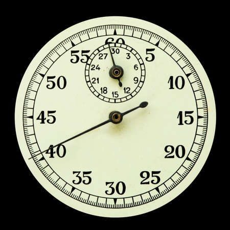 Stopwatch vintage dial face isolated on black backgroundの写真素材