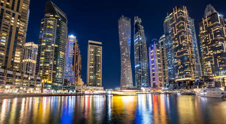 Dubai Marina modern district at night, UAEの写真素材