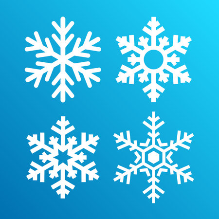 Vector snowflake icons set isolated on blue backgroundのイラスト素材