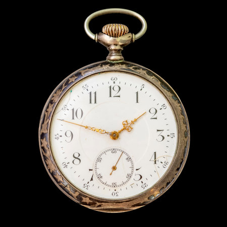 Antique silver pocket watch isolated over black backgroundの写真素材