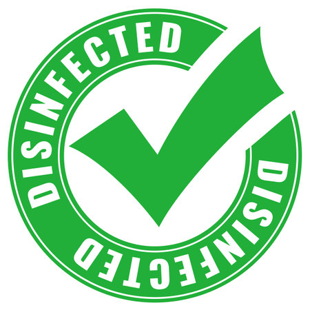 Green circular disinfected badge, vector illustration over white backgroundのイラスト素材