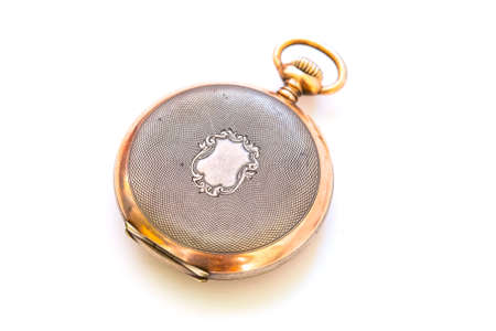 Old gold pocket watch isolated on white backgroundの写真素材