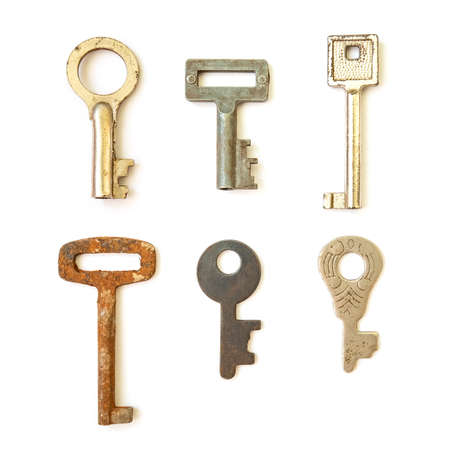 Old vintage keys isolated on white backgroundの写真素材