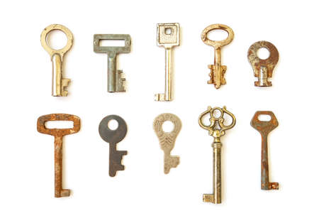 Old skeleton keys isolated on white backgroundの写真素材
