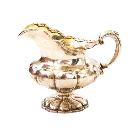 Antique silver jug isolated on white backrgoundの写真素材