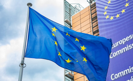 Brussels, Belgium - 21 May, 2022: European Union flag in front of the Berlaymont building,...