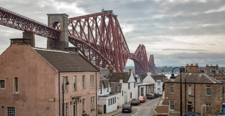 Forth Bridge and North Queensferry town skyline, Scotland travel photoのeditorial素材
