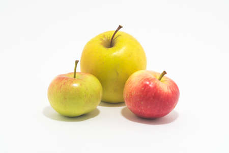 Apples. Three apples. Isolated on white background.の写真素材