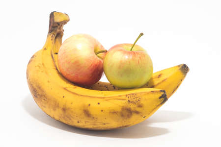 Banana. Ripe bananas with apples. Isolated on white background.の写真素材