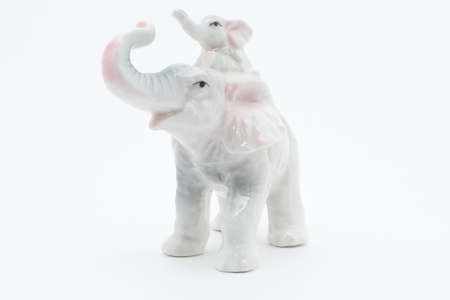 Porcelain elephants. Isolated on white backgroundの写真素材