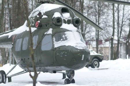 Old Russian helicopter in the snow for any purposeの写真素材