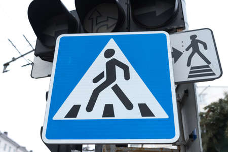 Sign pedestrian crossing under the traffic light for any purposeの写真素材