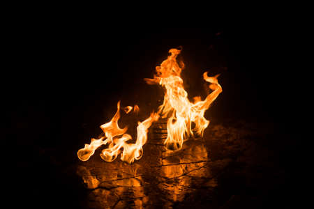 Fire up the fan lying on the ground, at night, for any purposeの写真素材