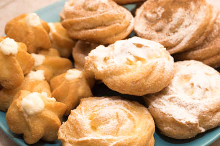 Cake profiteroles and Shu on a platter for any purposeの写真素材