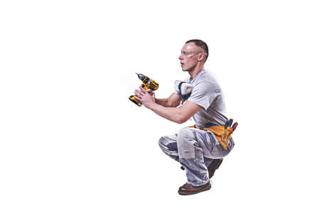 Master Builder-finisher in work clothes. Isolated on white background for any purpose