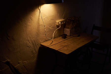 Wooden table in dim lighting for any purpose