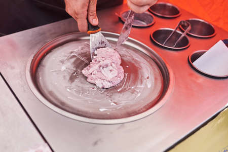 The cooking process fried Thai ice cream on the street. For any purpose.