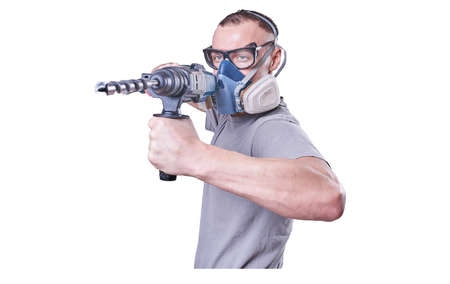 Man, Builder, glasses, with a drill in hand isolated on white background.For all purposesの写真素材