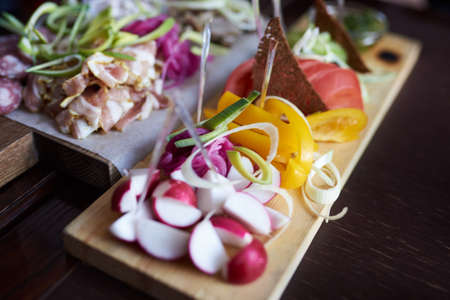 Sliced vegetables and meat with sauce. Selective focus.For all purposesの写真素材