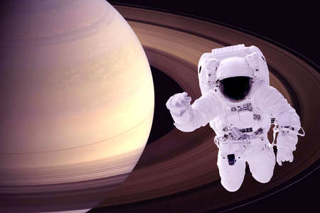 Saturn Orbiting Astronautの写真素材