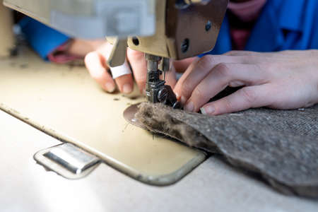 Sewing details of fur and leather. Shoe production. For any purpose.