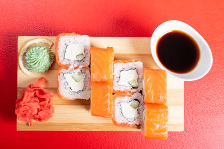 Philadelphia roll with various fillings. with ginger and wasabi. For any purpose.の写真素材