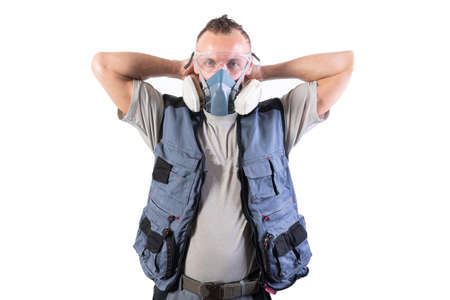 Builder is putting on a respirator. For any purpose.の写真素材