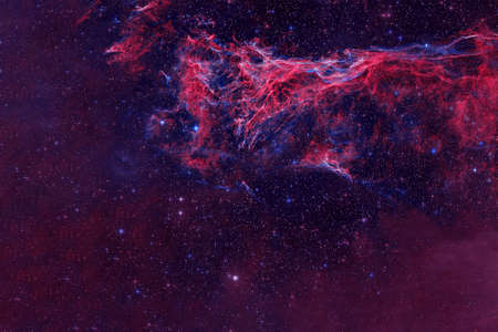 Bright torn space nebula. Background texture.の写真素材