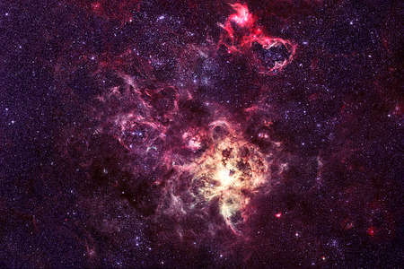 Unusual cosmic nebula, with gaps and stars.