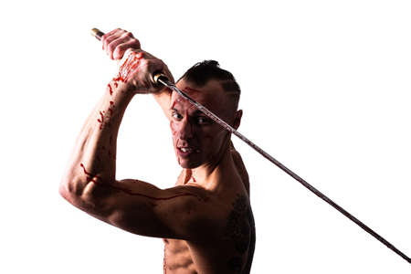Portrait of a man with a sword, in the blood of the enemy. Isolated on a white background.