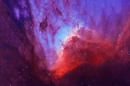 Bright red nebula with stars.