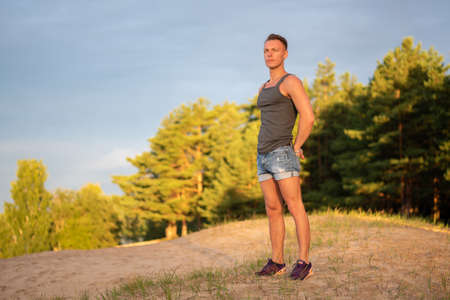 A man looks thoughtful in depth, in natureの写真素材