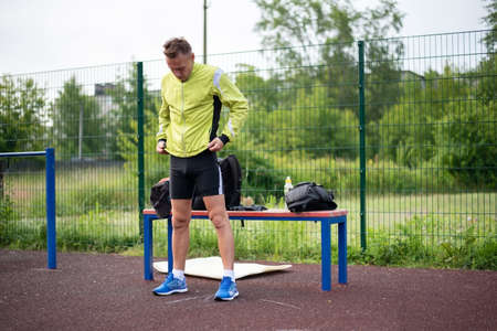 A man is preparing for training at the stadium. For any purpose.の写真素材