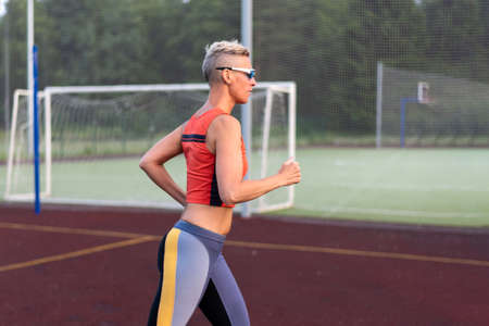 The woman at the stadium is coaching For any purpose.の写真素材