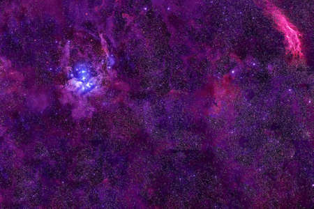Beautiful pink cosmic nebula in deep space.