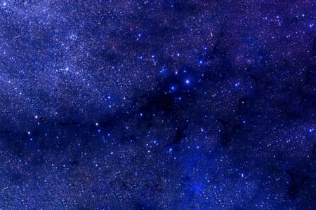 Beautiful blue space with stars and nebulae.