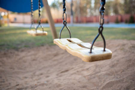 Childrens chain swing on the playground. For any purposes.の写真素材